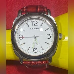 Vintage Joe Boxer Quartz Red Leather Watch
Unisex Needs Battery
